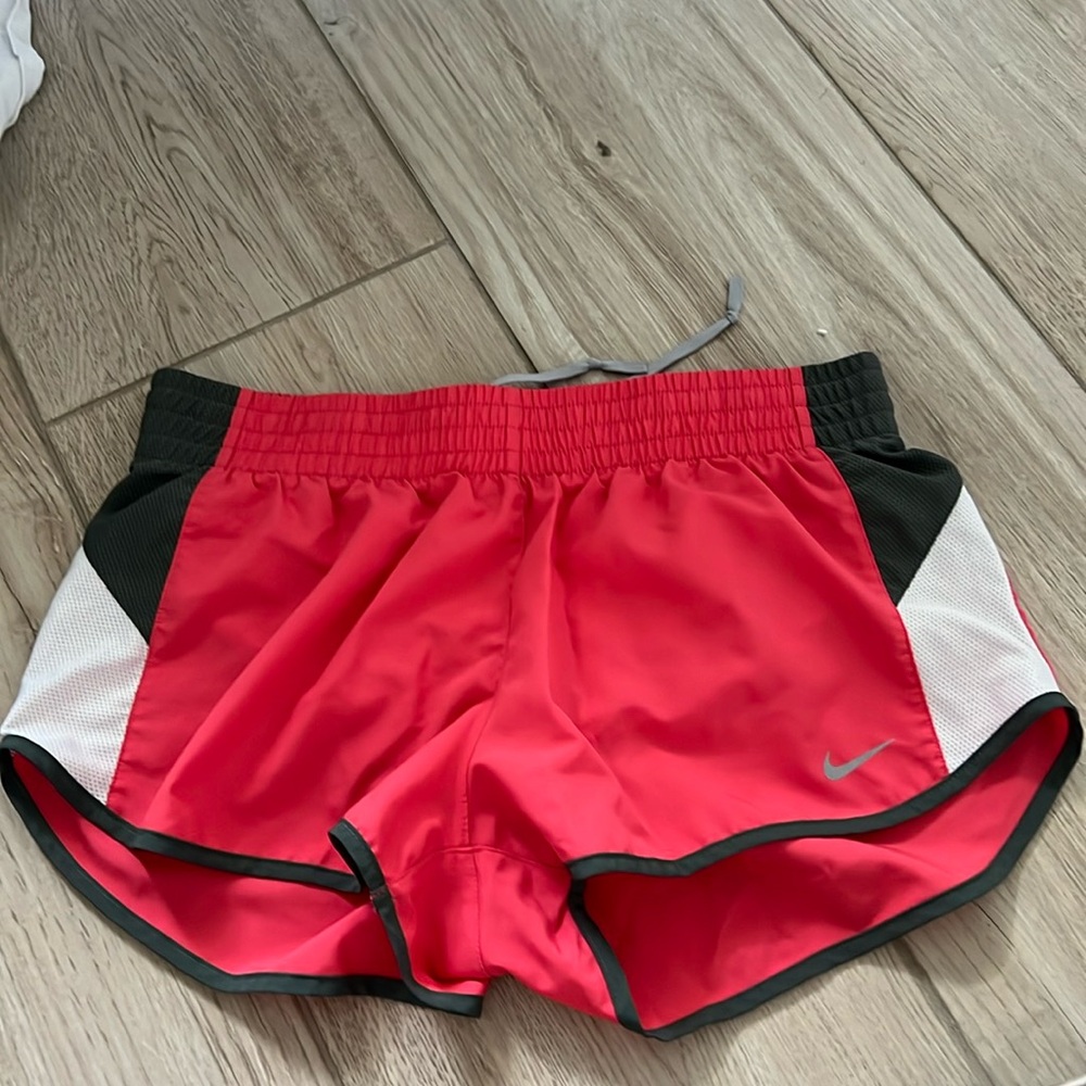 Pink and grey Nike shorts